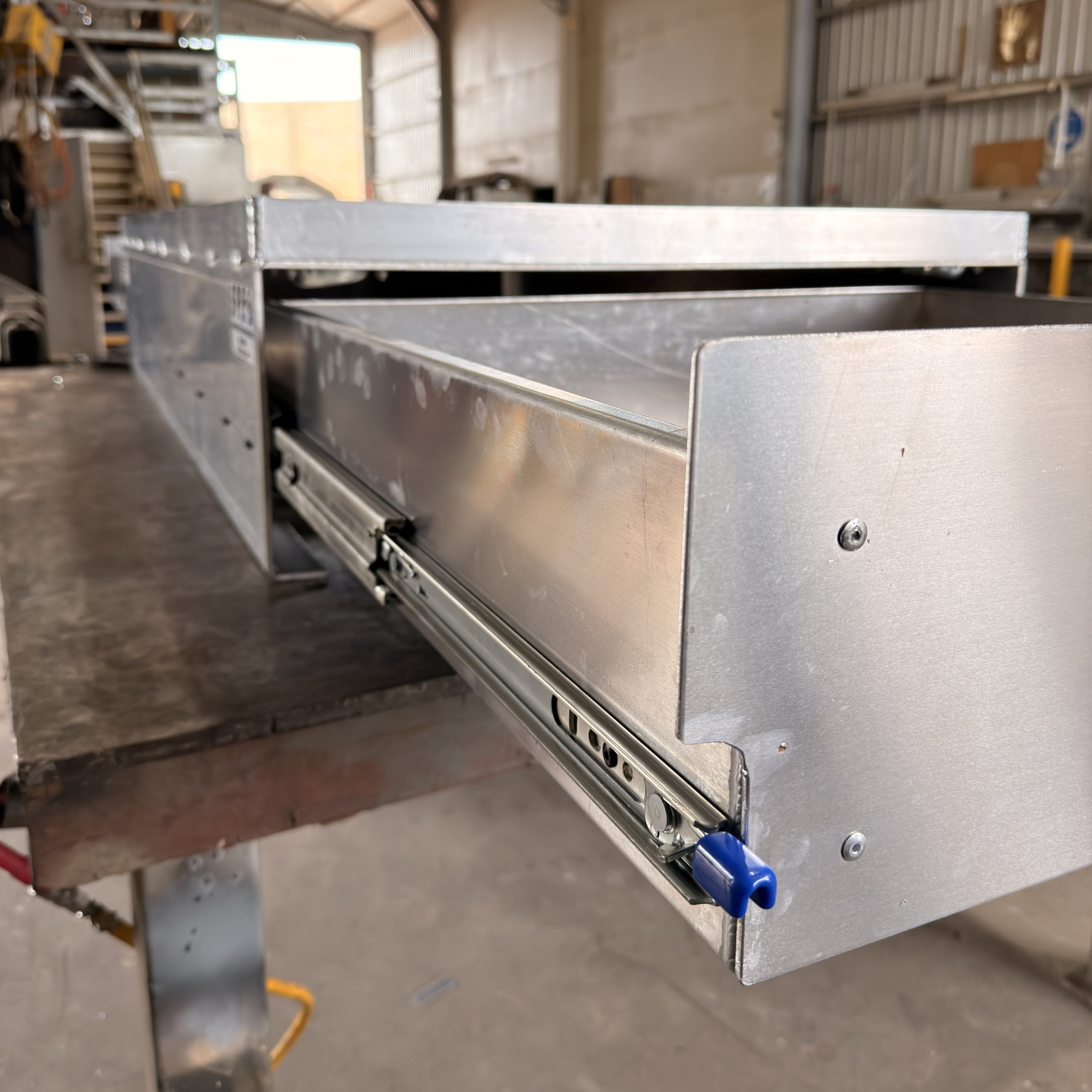 Double sided canopy drawer installed